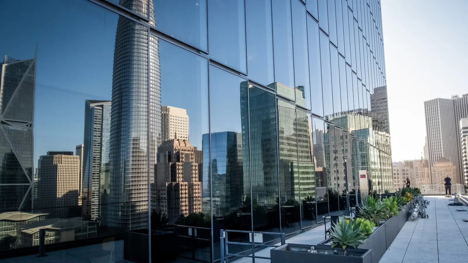 San Francisco skyline reflected in a glass building