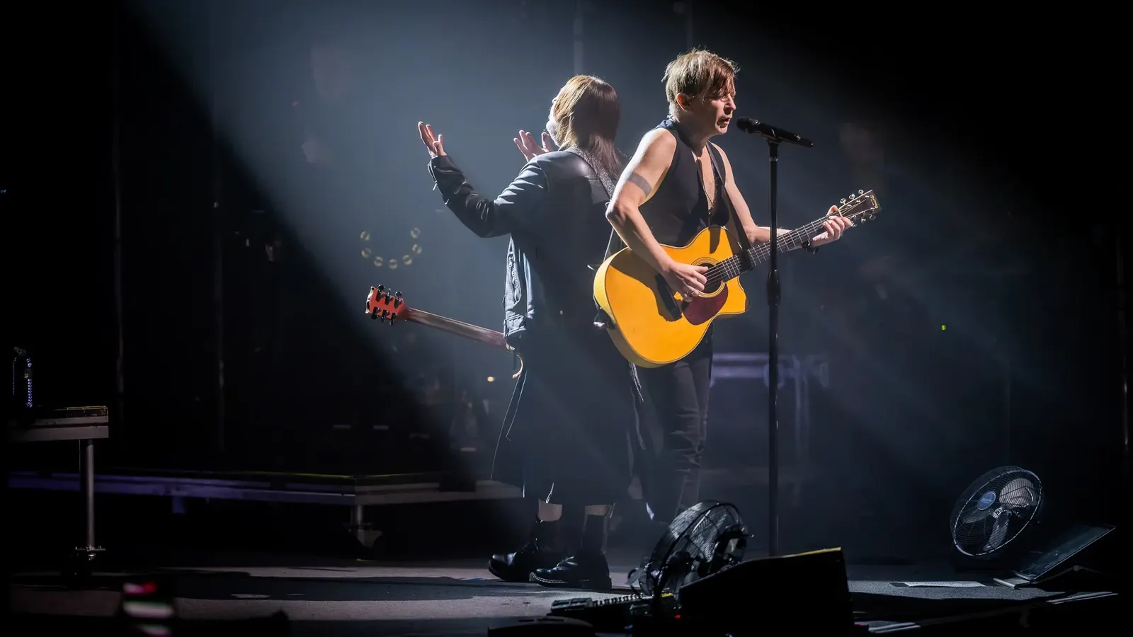 Guitarist in a white spotlight