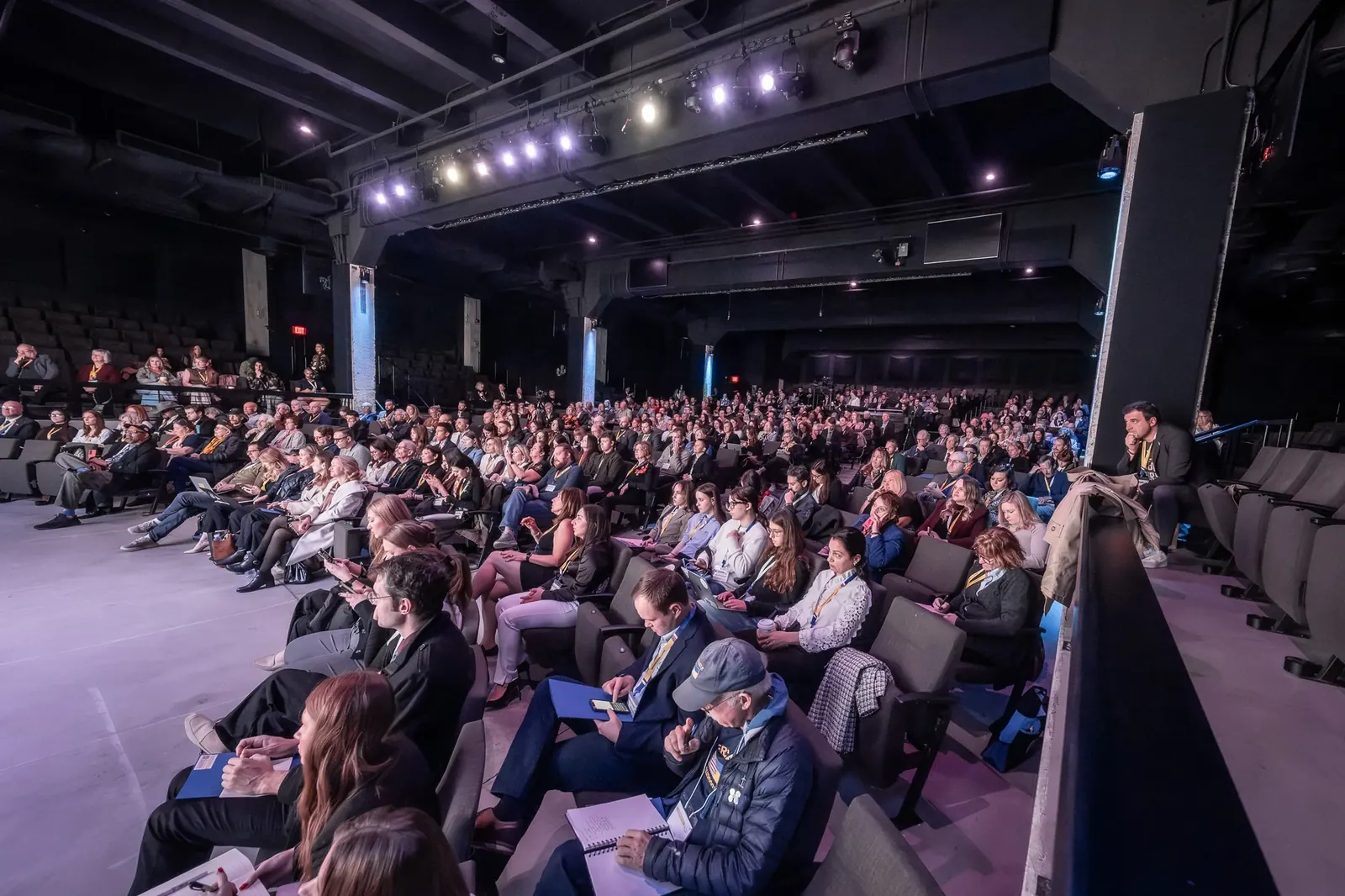 Wide view of a seated conference audience in Washington